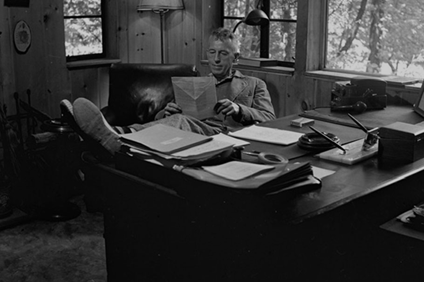 Bill Wilson at his desk — from the documentary
